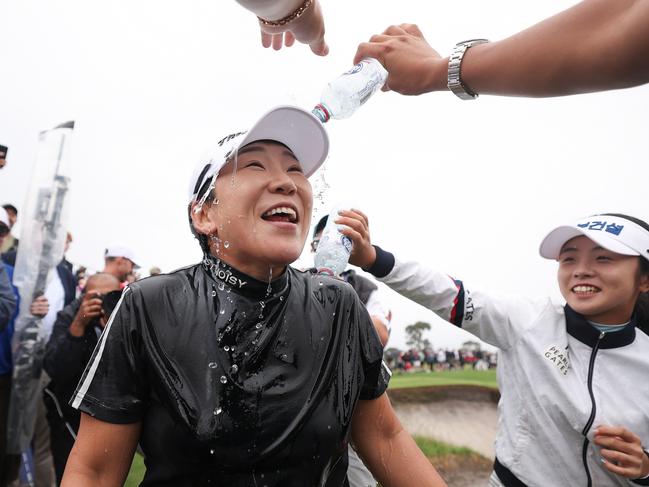 Jiyai Shin celebrates her Australian Open win on the 18th green. Picture: Morgan Hancock/Getty Images