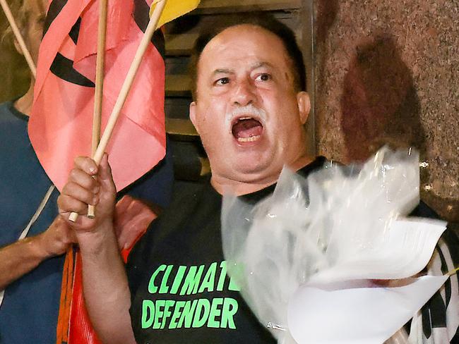 Protester Joe Zammit 68yrs leaves the Magistrates Court after being arrested as part of an Extinction Rebellion protest on the Westgate Bridge. Picture: Ian Currie