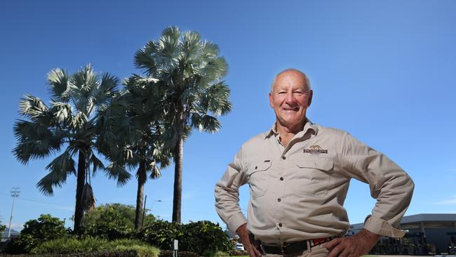 Sydney man Derek McIntosh is the creator and curator of the National Register of Big Trees. Here he stands in front of a Bismark Palm, 15.8 metres tall. Picture: Brendan Radke