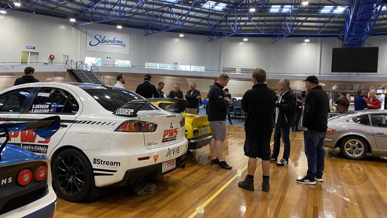 Targa Tasmania drivers and navigators remain in the Silverdome after the event was cancelled. Picture James Bresnehan