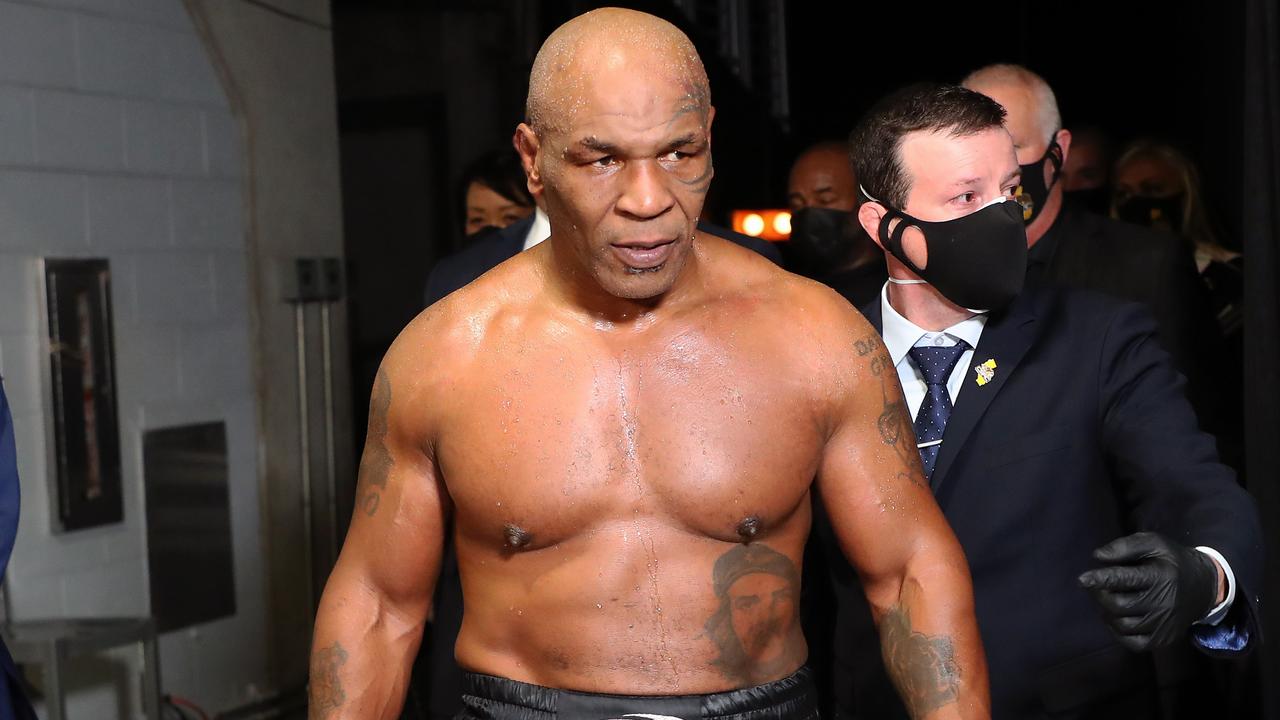 Mike Tyson was not impressed. (Photo by Joe Scarnici / GETTY IMAGES NORTH AMERICA / AFP)