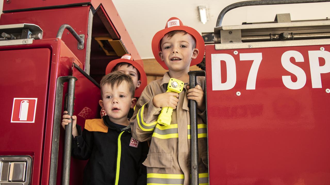 Malu with his brothers at the Werribee Fire Station. Picture: Supplied