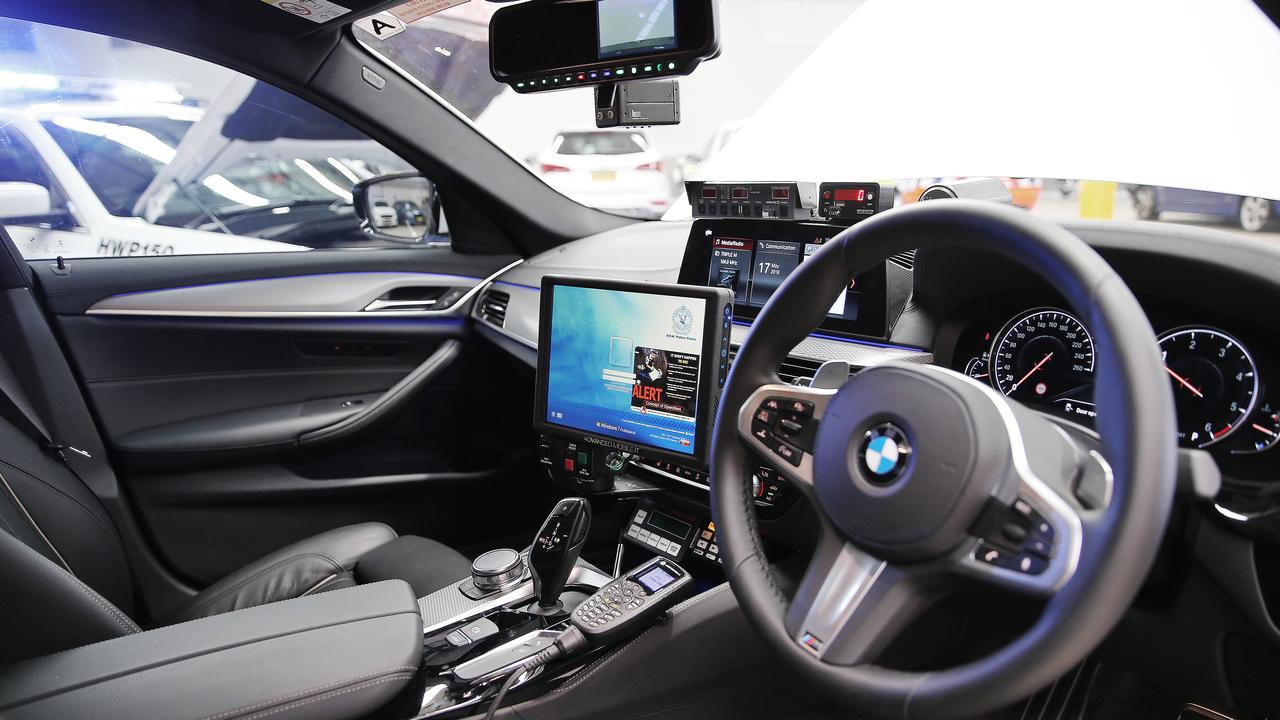 Sophisticated data terminals in Police cars offer astounding information, but can be complex to operate and pose a hazard in serious crashes. Picture: Sam Ruttyn