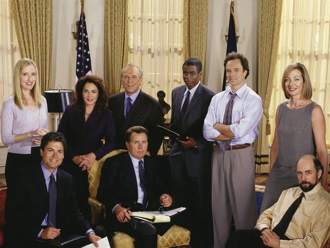 Cast of TV show The West Wing. Actor Rob Lowe with Martin Sheen, Richard Schiff and (l-r rear) Janel Maloney, Stockard Channing, John Spencer, Dule Hill, Bradley Whitford and Allison Janney.