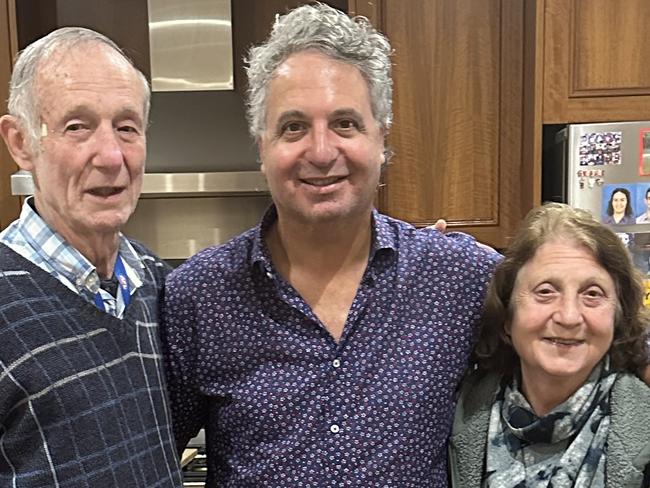 Guerra (middle) with parents John and Lena.