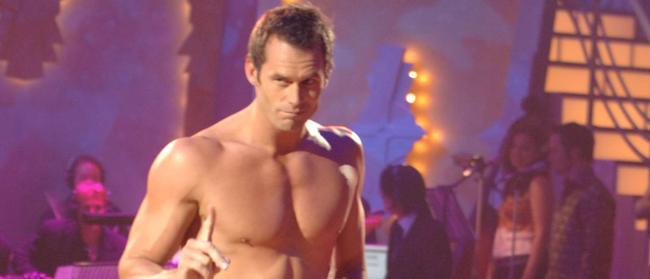 A bare-chested Tom Williams as he competes in grand final of TV show Dancing With the Stars, with dancer Kym Johnson.