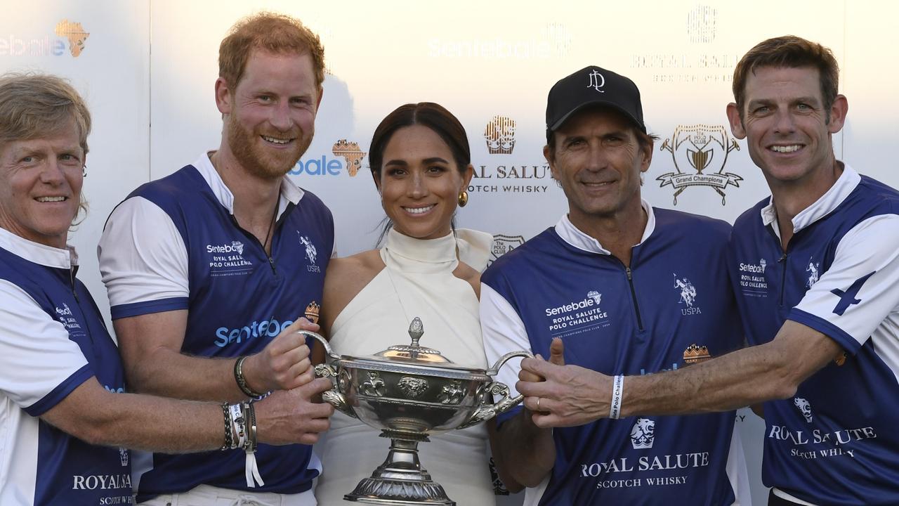 WELLINGTON, FLORIDA - APRIL 12: Dana Barnes, Prince Harry, Duke of Sussex, Meghan, Duchess of Sussex, Adolfo Cambiaso and Malcolm Borwick during the Royal Salute Polo Challenge benefitting Sentebale at Grand Champions Polo Club on April 12, 2024 in Wellington, Florida. The annual Polo Cup has been running since 2010, and to date has raised over ÃÂ£11.4 million to support Sentebale's work with children and young people affected by poverty, inequality and HIV/AIDS in southern Africa. (Photo by Jason Koerner/Getty Images for Sentebale)