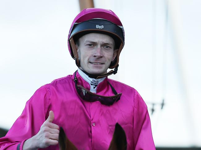 SYDNEY, AUSTRALIA - JULY 20: Benjamin Osmond riding Robusto wins Race 9 TAB during "Winter Challenge Day" - Sydney Racing at Rosehill Gardens on July 20, 2024 in Sydney, Australia. (Photo by Jeremy Ng/Getty Images)