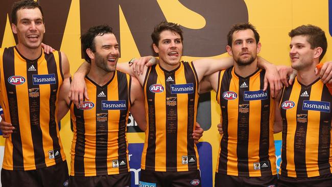 Hawks Jonathon Ceglar, Jordan Lewis, Isaac Smith, Luke Hodge and Luke Breust celebrate a memorable win. Picture: Getty