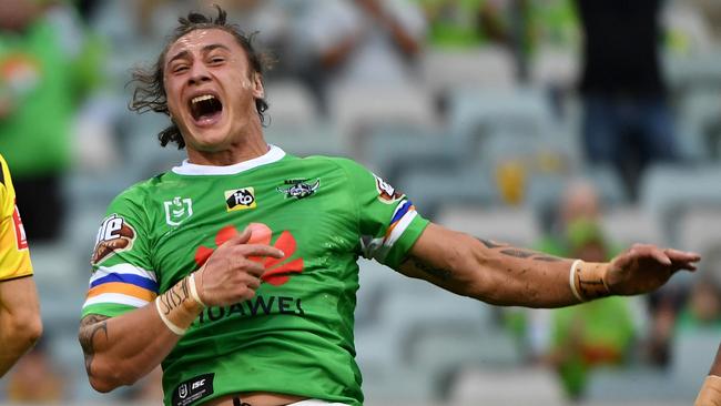 CANBERRA, AUSTRALIA - MARCH 29: Charnze Nicoll-Klokstad of the Raiders celebrates scoring a try during the round three NRL match between the Canberra Raiders and the Newcastle Knights at GIO Stadium on March 29, 2019 in Canberra, Australia. (Photo by Tracey Nearmy/Getty Images)