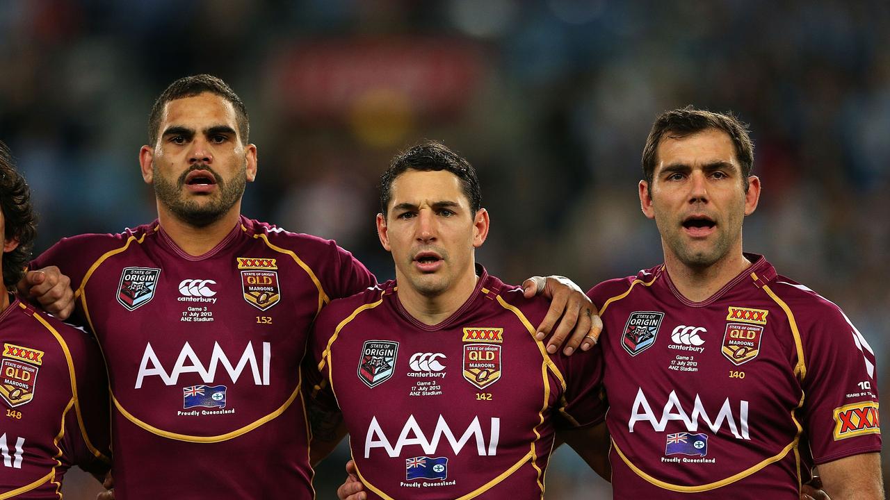 Smith and Slater, pictured with Greg Inglis, formed the backbone of Queensland’s on-field dynasty. Picture: Getty