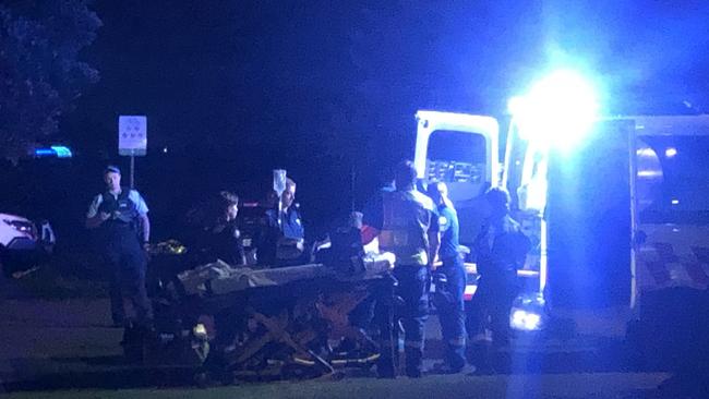 Emergency services work to stabilise the 85-year-old. Picture: Jim O’Rourke