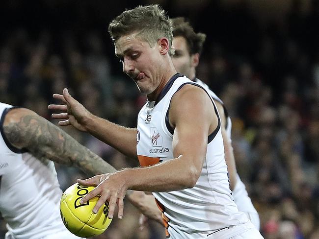 AFL - ROUND 12 - Adelaide Crows v GWS Giants at Adelaide Oval. Harry Perryman snaps a goal on the run. Picture SARAH REED