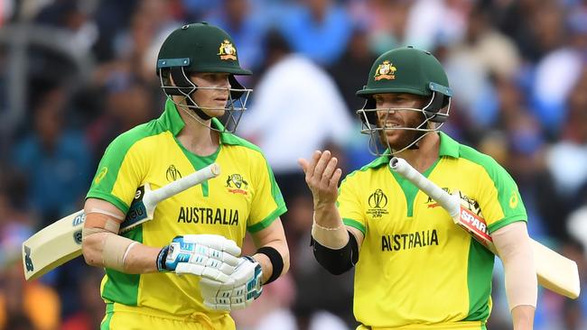 Steve Smith (L) and David Warner are also poised to return to Australia’s T20 national team. Picture: Dibyangshu Sarkar/AFP