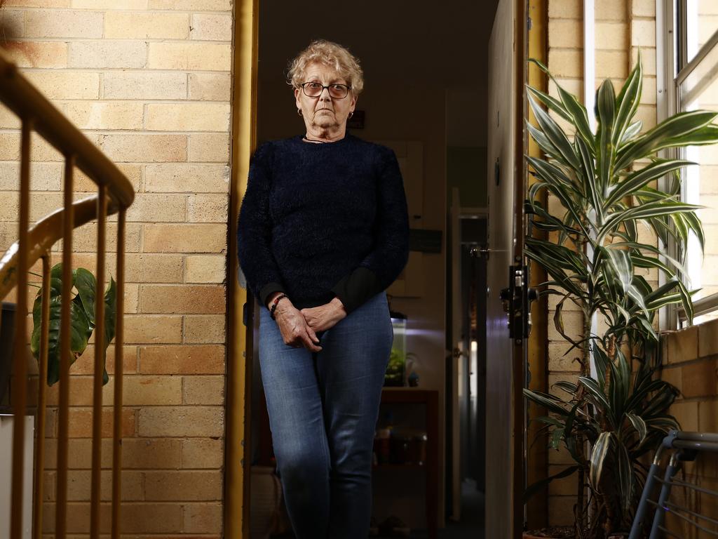 Susana Isern, 75, at her public housing apartment in Miller. Power was cut off to her building’s common areas because the government forgot to pay the bill. Picture: Jonathan Ng