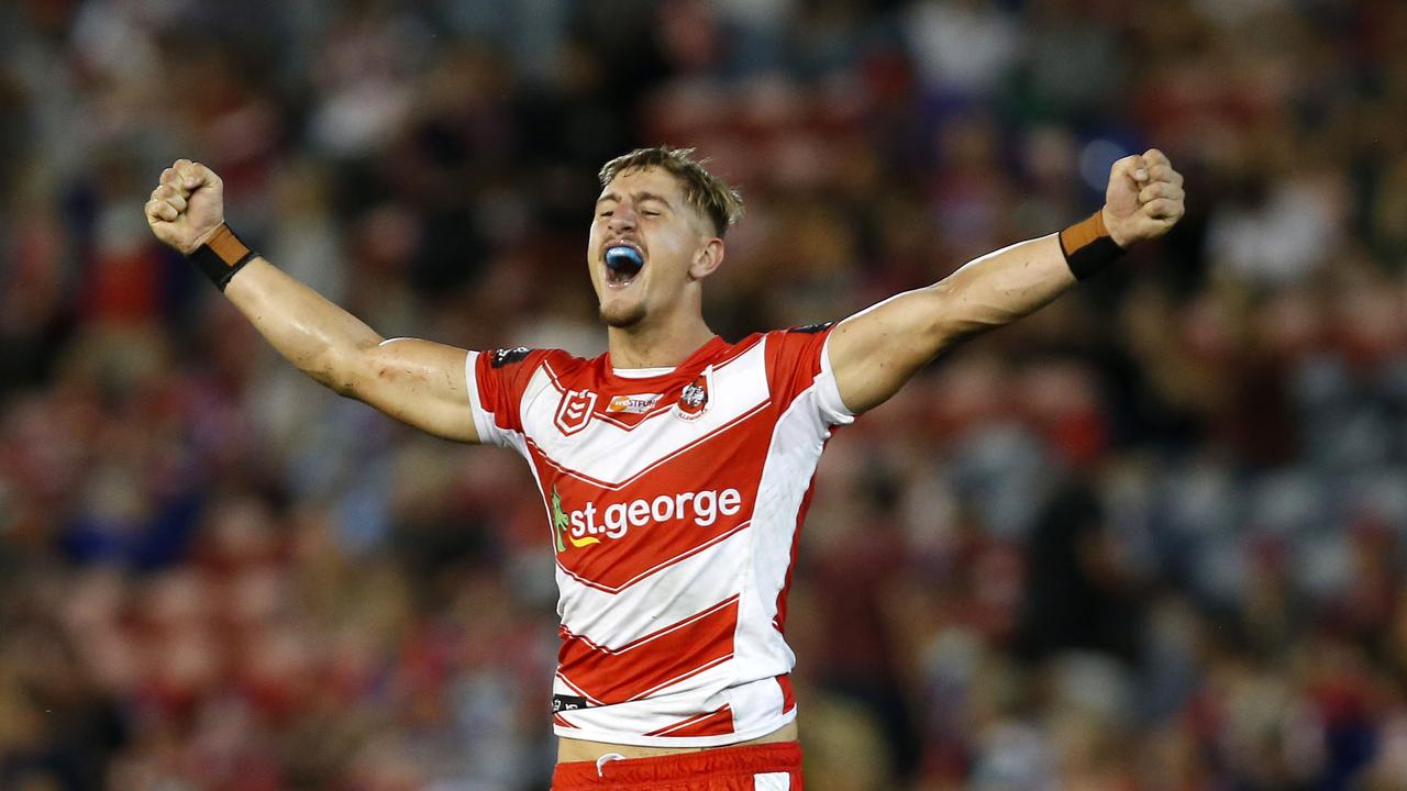 Dragons player Zac Lomax celebrates winning in golden point against Newcastle