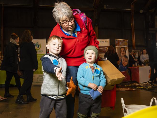 Janelle McIvor of Empowered Family Daycare with Tyson Saxton (left) and Jai Harper at Toowoomba NAIDOC Week celebrations at The Goods Shed, Monday, July 4, 2022. Picture: Kevin Farmer