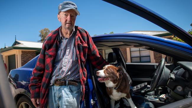 Tom Sullivan is worried he may have to live in his car with his dog Archie. Picture: Naomi Jellicoe