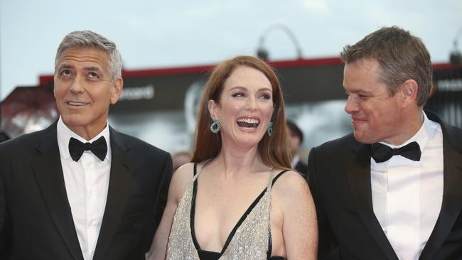 Leading lady Julianne Moore with director George Clooney and Matt Damon. Picture: AP