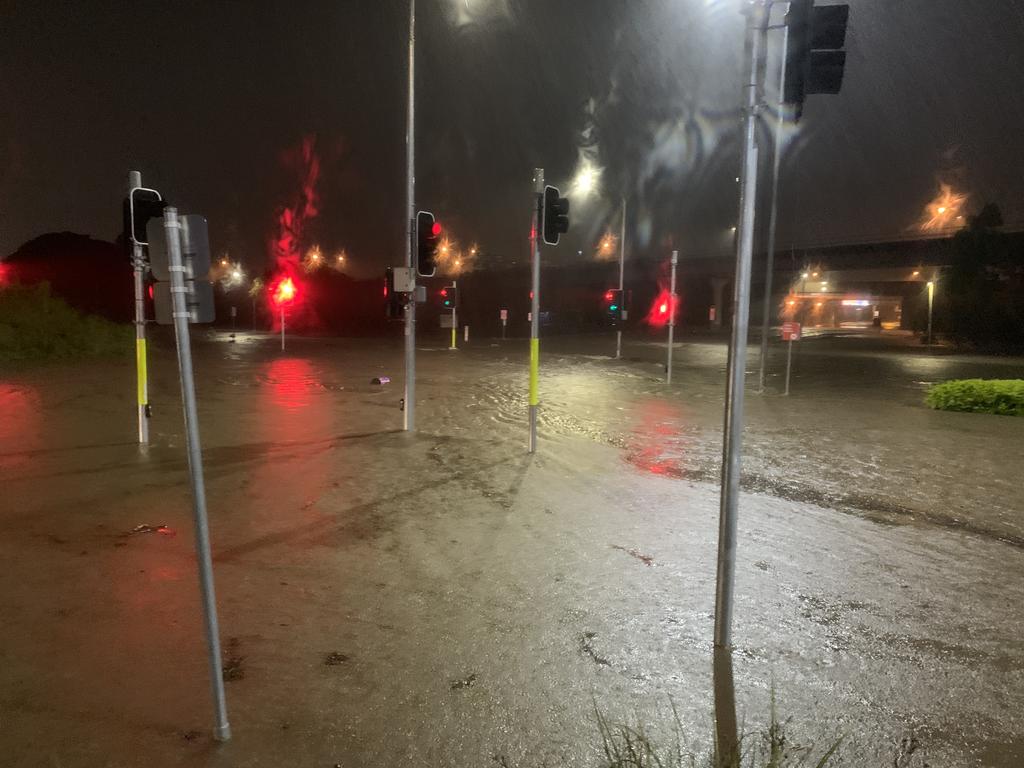 Melton Rd outside Toombul Shopping Centre was closed on Friday night due to flooding. Picture: Patrick Billings