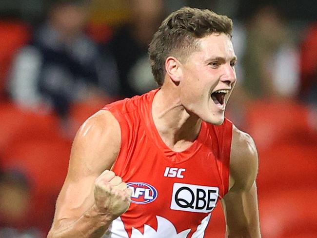 GOLD COAST, AUSTRALIA - SEPTEMBER 08: Hayden McLean of the Swans celebrates kicking a goal during the round 16 AFL match between the Carlton Blues and the Sydney Swans at Metricon Stadium on September 08, 2020 in Gold Coast, Australia. (Photo by Chris Hyde/Getty Images)