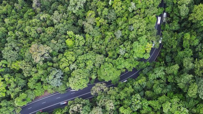 Aerial view of the Kennedy Highway snaking through World Heritage listed rainforest up the McAllister Range. . Picture: Brendan Radke