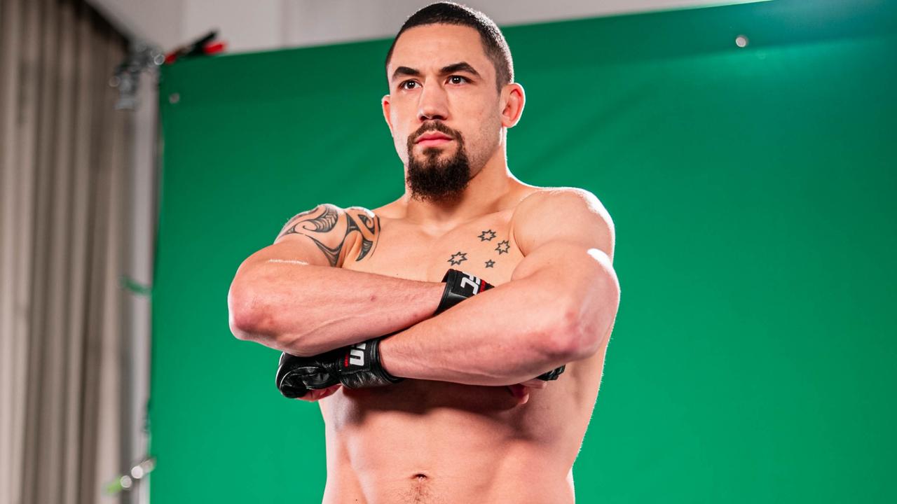 Rob Whittaker poses up on the eve of UFC 271