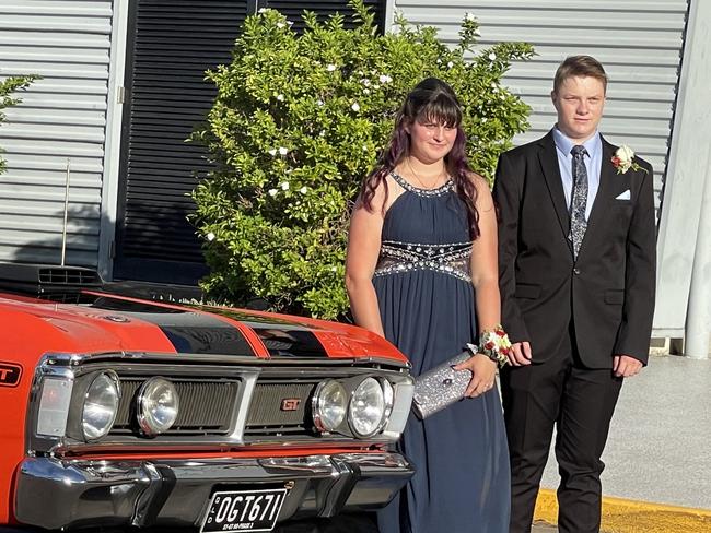 Ellie Cash and Tim Enchelmaier arrive at the formal in a XY Ford Falcon.