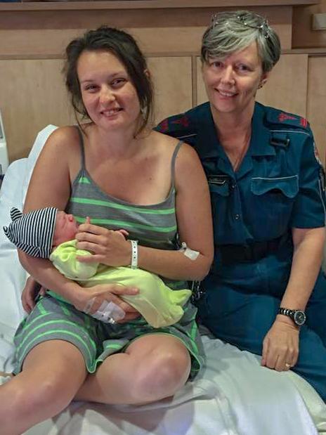 Peta Costigan with baby and her paramedic at Emerald Hospital