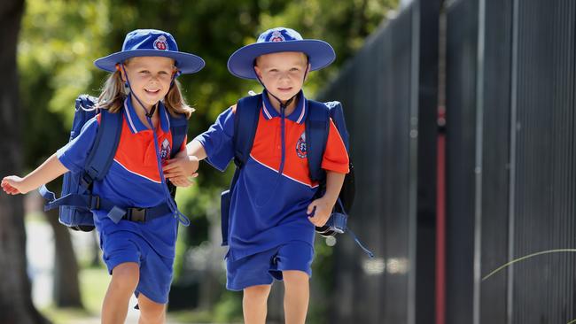 Cousins Alexis Cohen and Malachi Hodges are fifth generation Manly State School students who started at the school in 2018. (AAP Image/Jono Searle)