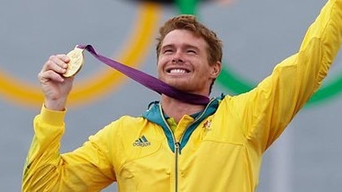 That’s gold! Tom Slingsby with his London Olympic gold medal.