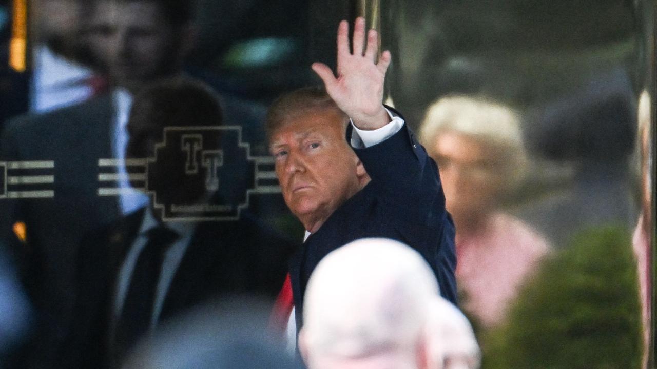 Mr Trump waved at those waiting at Trump Tower when he arrived. Picture: Andrew Caballero-Reynolds/AFP