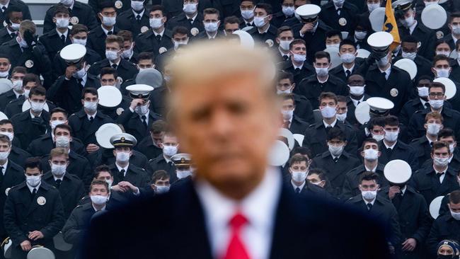 US President Donald Trump is seen in front of the stands with Naval Academy cadets during the Army-Navy football game Picture: Brendan Smialowski/AFP