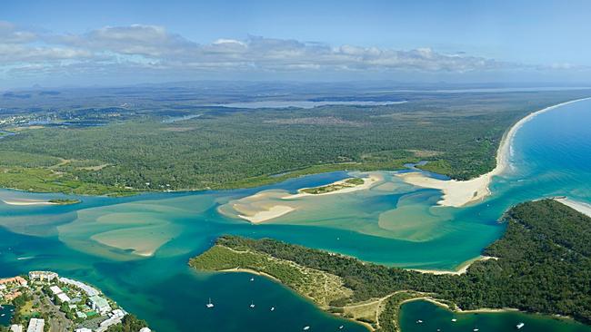 A person was plucked from the water north of Noosa less than a day after a woman’s body was found on a popular Sunshine Coast beach.