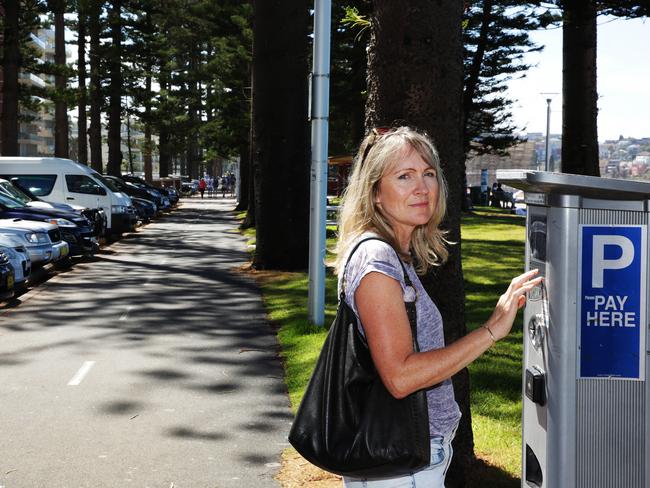 Leslie Sargaent parked her car on North Steyne and put her rego in the ticket box. She was fined five minutes later. Picture: Vigrinia Young.