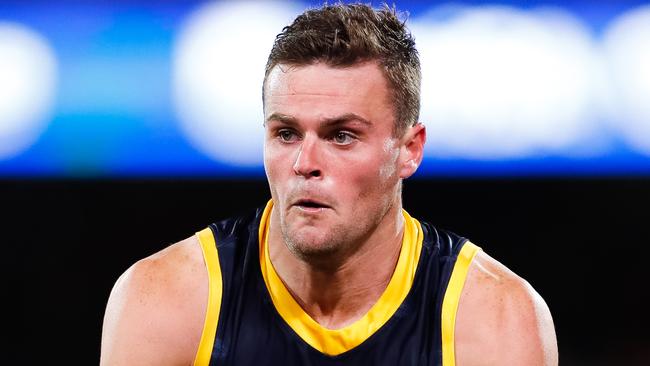 ADELAIDE, AUSTRALIA - JULY 20: Brad Crouch of the Crows runs with the ball during the round 7 AFL match between the Adelaide Crows and the St Kilda Saints at Adelaide Oval on July 20, 2020 in Adelaide, Australia. (Photo by Daniel Kalisz/Getty Images)