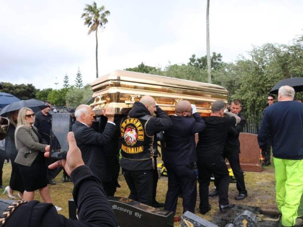 Tarek Zahed, wearing Comanchero colours (centre) carrying Mark Buddle's mother's coffin at her funeral. Picture: Supplied