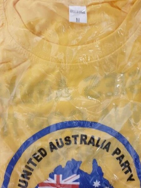 One of the plastic-wrapped shirst with a ‘made in China’ tag.