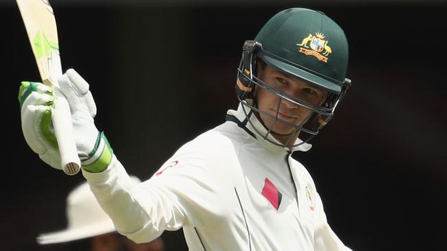 Peter Handscomb of Australia celebrates an historic half-century at the SCG.