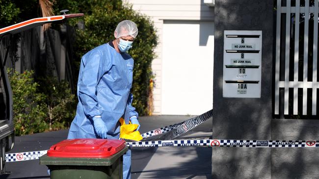 A forensic office at the scene of the shooting. Picture: David Clark