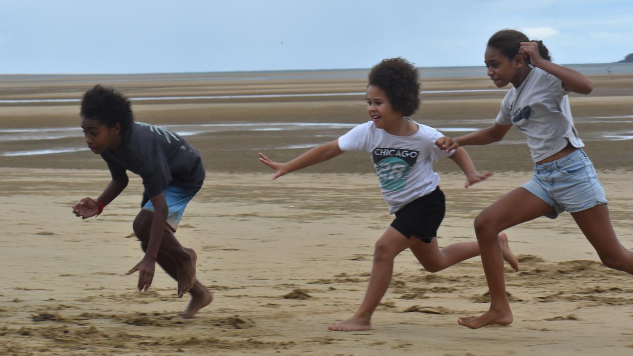 Esaias Woyse, Lyle Davis and Chloe Yasserie racing at the Mackay & District South Sea islander Association's 2022 Australia Day Celebrations in Quota Park. Picture: Lillian Watkins