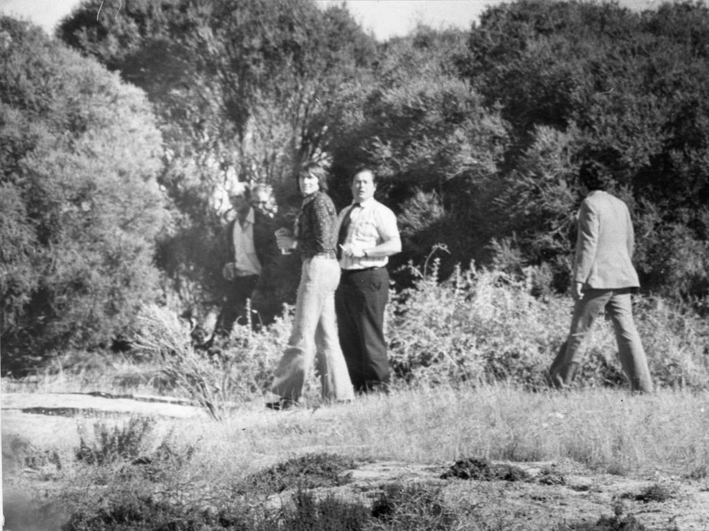 James William Miller, left, arriving at the Port Gawler search site with police on May 24, 1979.