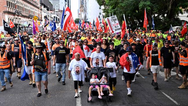 The family of deceased Cross River Rail Worker Daniel Sa’•u, his wife Geraldine and daughters Clover and Thira, taking part in a CFMEU• union rally in Brisbane. Picture: Dan Peled / NCA NewsWire
