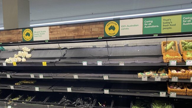 Supermarket shelves are almost empty, and Woolworths’ online delivery service is also struggling.