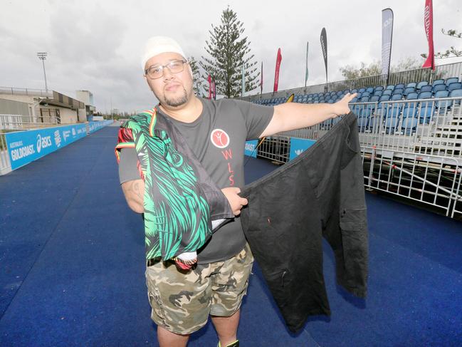 Pictured at the GC Marathon finish line, Corey Mahauariki who couldn't walk to his letterbox a year ago. Now he'll be running the 5.7km at this weekend's marathon. Picture Mike Batterham