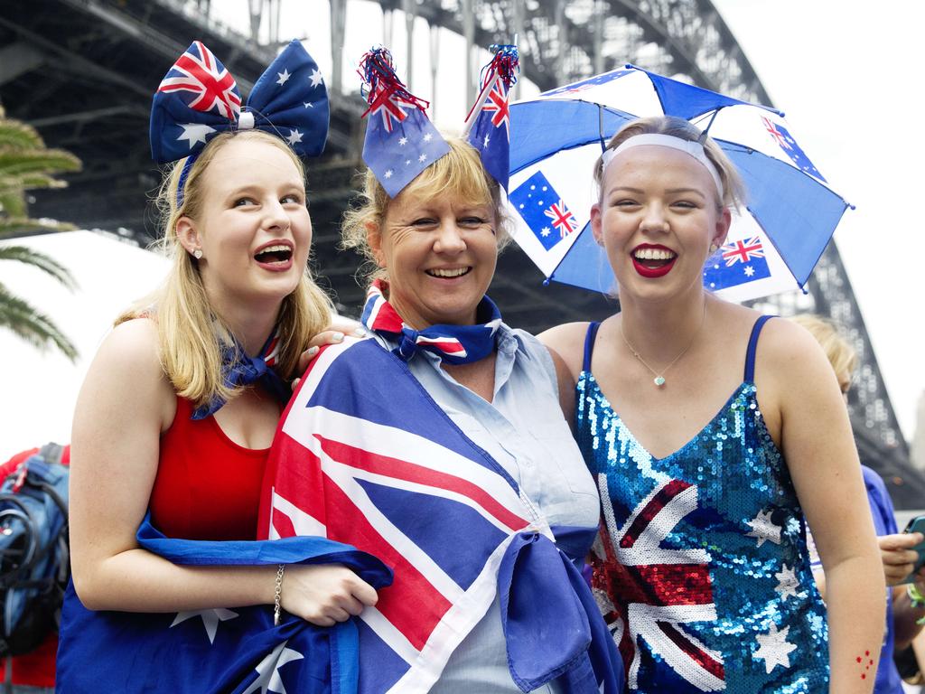 Madeleine Pagett (L), Lucinda Pagett (R) and mother Cath Pagett (C) enjoy Australia Day at Circular Quay in Sydney. Madeleine and Lucinda are twins and have spent every Australia day since they were born celebrating the occasion. Picture: Jenny Evans