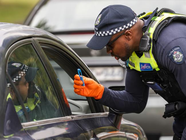 MELBOURNE, AUSTRALIA - NewsWire Photos DECEMBER 23, 2022 : Victoria Police pull over drivers at a roadside drug and alcohol testing site in Southbank, as part of Operation Roadwise in the lead up to Christmas. Picture NCA NewsWire / Ian Currie