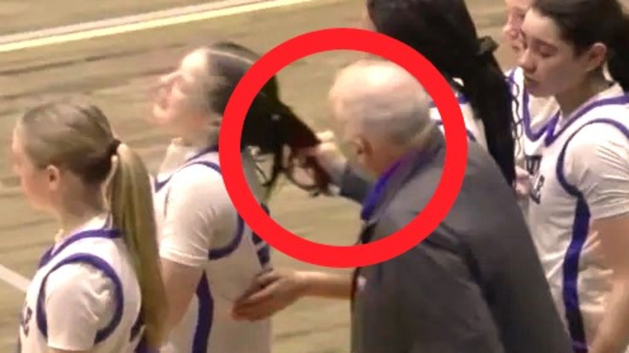 Coach breaks silence over hair pull scandal