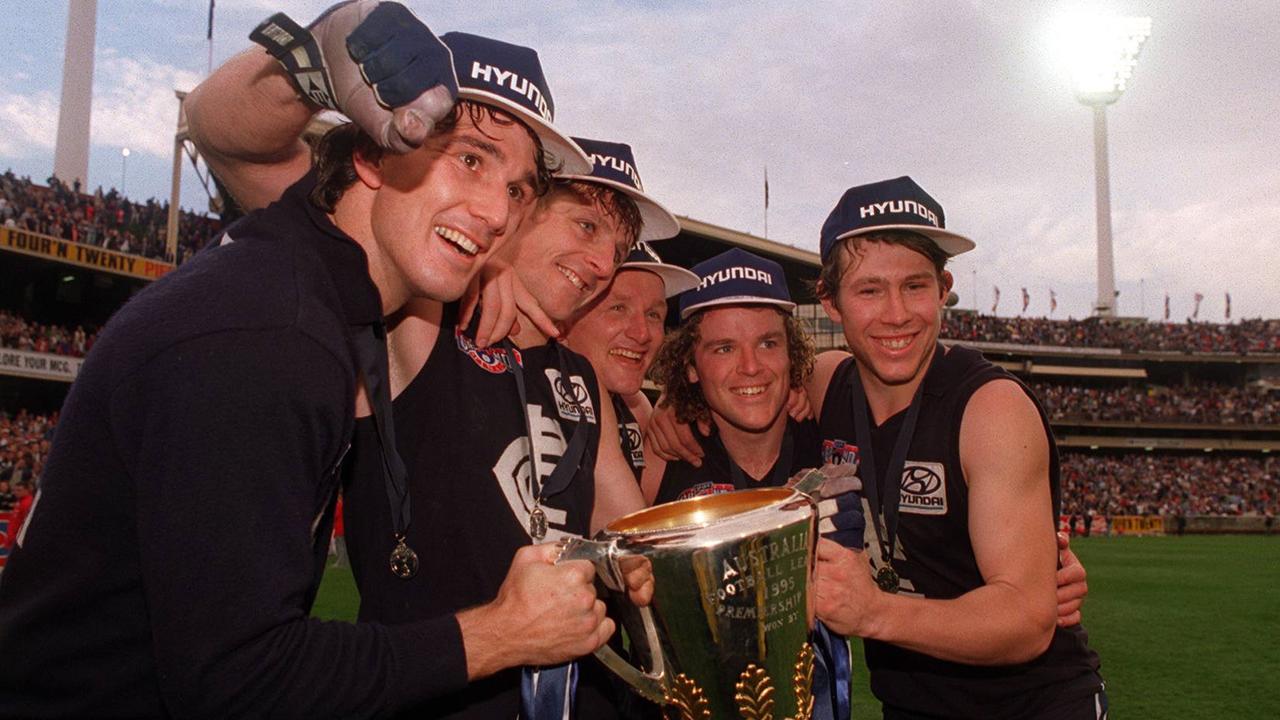 Carlton's Stephen Silvagni, Peter Dean, Craig Bradley, Fraser Brown and Brett Ratten celebrate winning the 1995 grand final against Geelong.