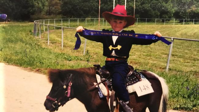 Star jockey Jamie Kah with her pony as a child. Picture: Supplied